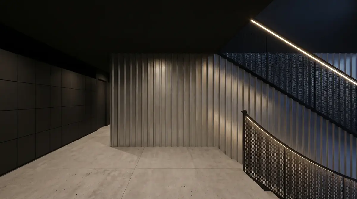 Corredor interno em concreto e metal iluminado
